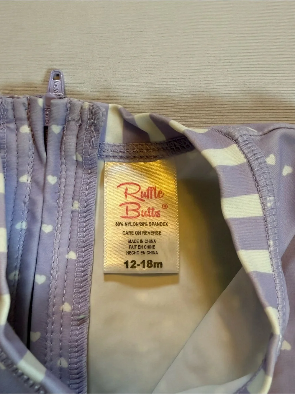 RuffleButts Girls Purple Heart Long Sleeve One Piece Swimsuit 12-18M
